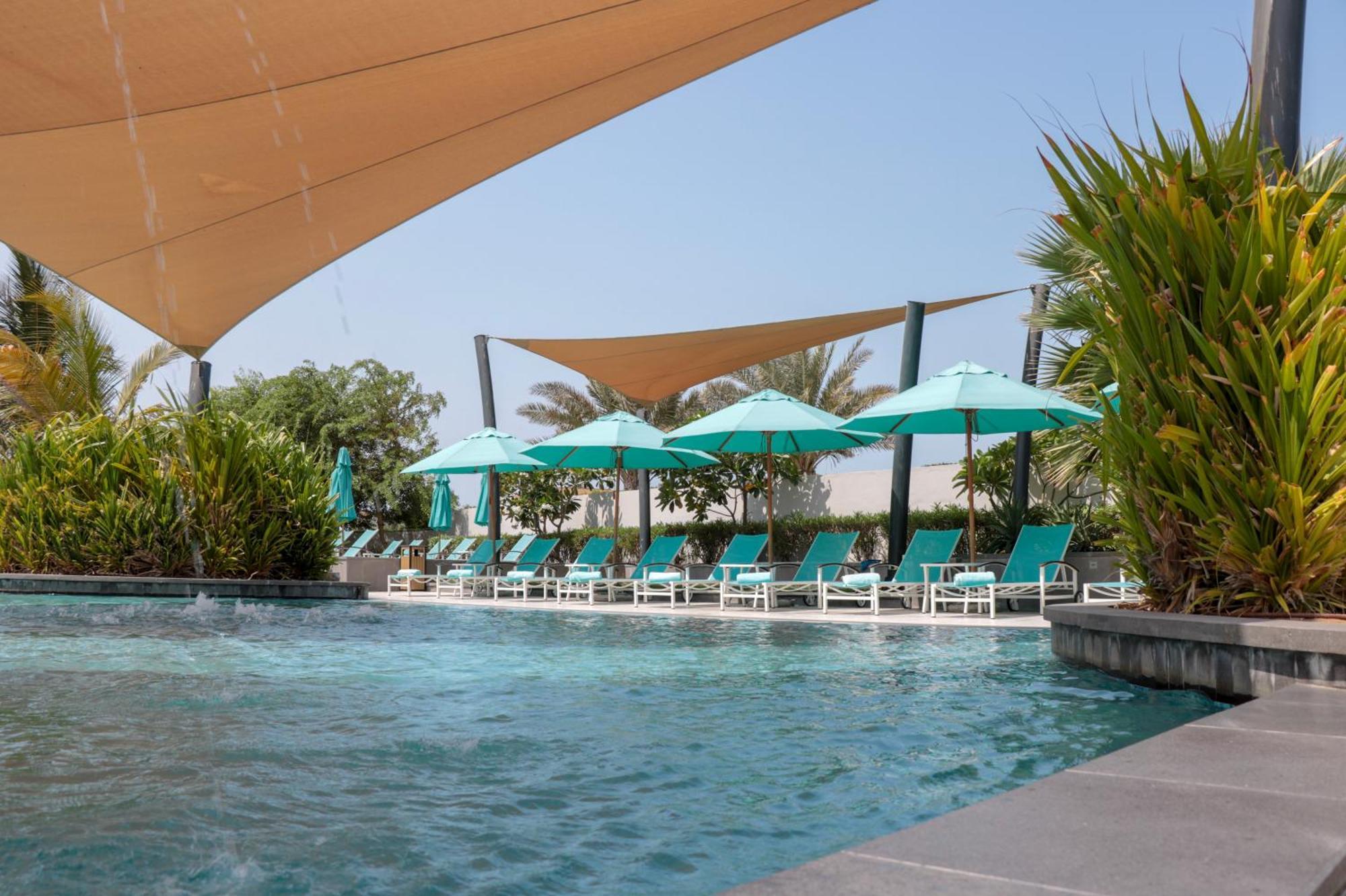 Bay La Sun Hotel And Marina - Emaar King Abdullah Economic City Экстерьер фото The swimming pool at the hotel